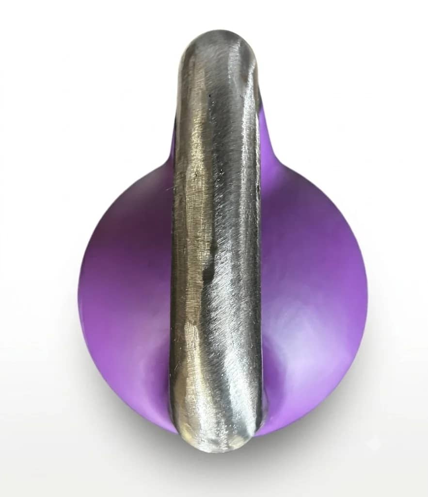 Top-down close-up of the 34 mm unpainted polished-steel handle on an Incore Sports competition kettlebell